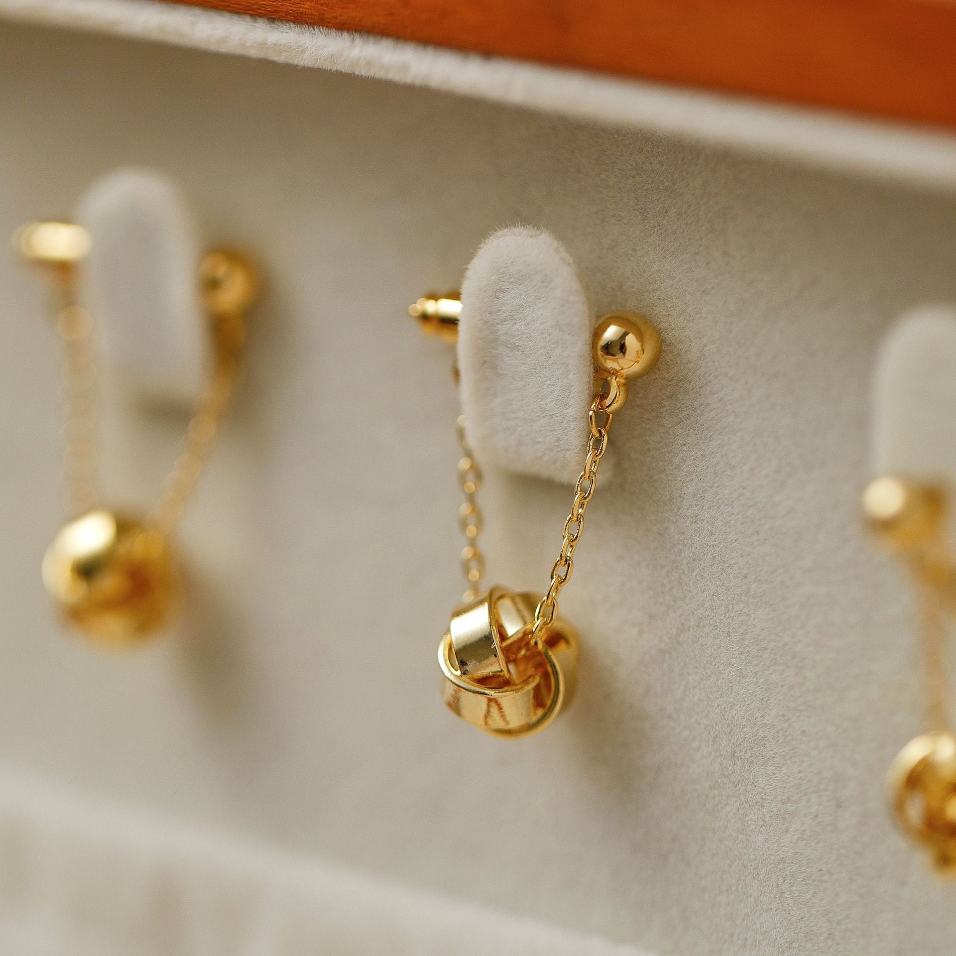 The Pumpkin Carriage French Gold Small Mosquito Coil Earrings