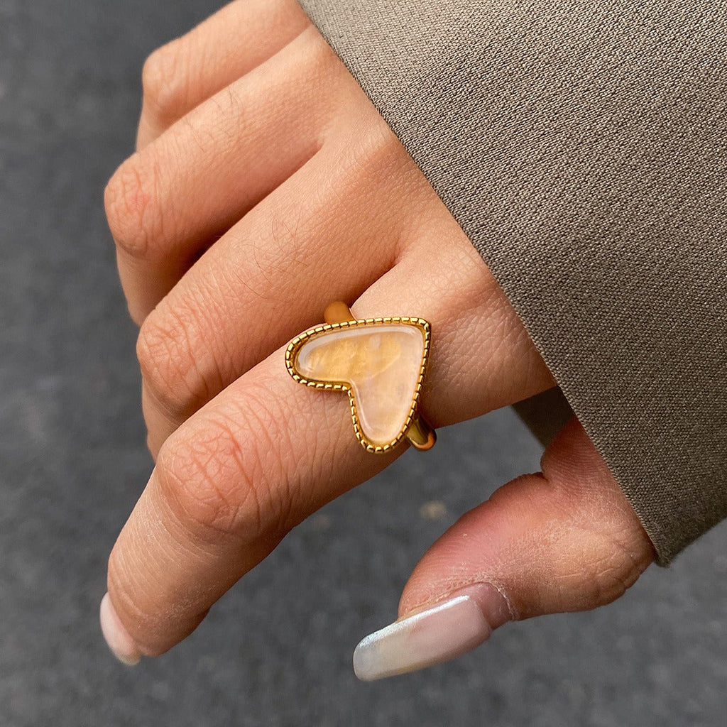 18K gold heart-shaped ring with textured design