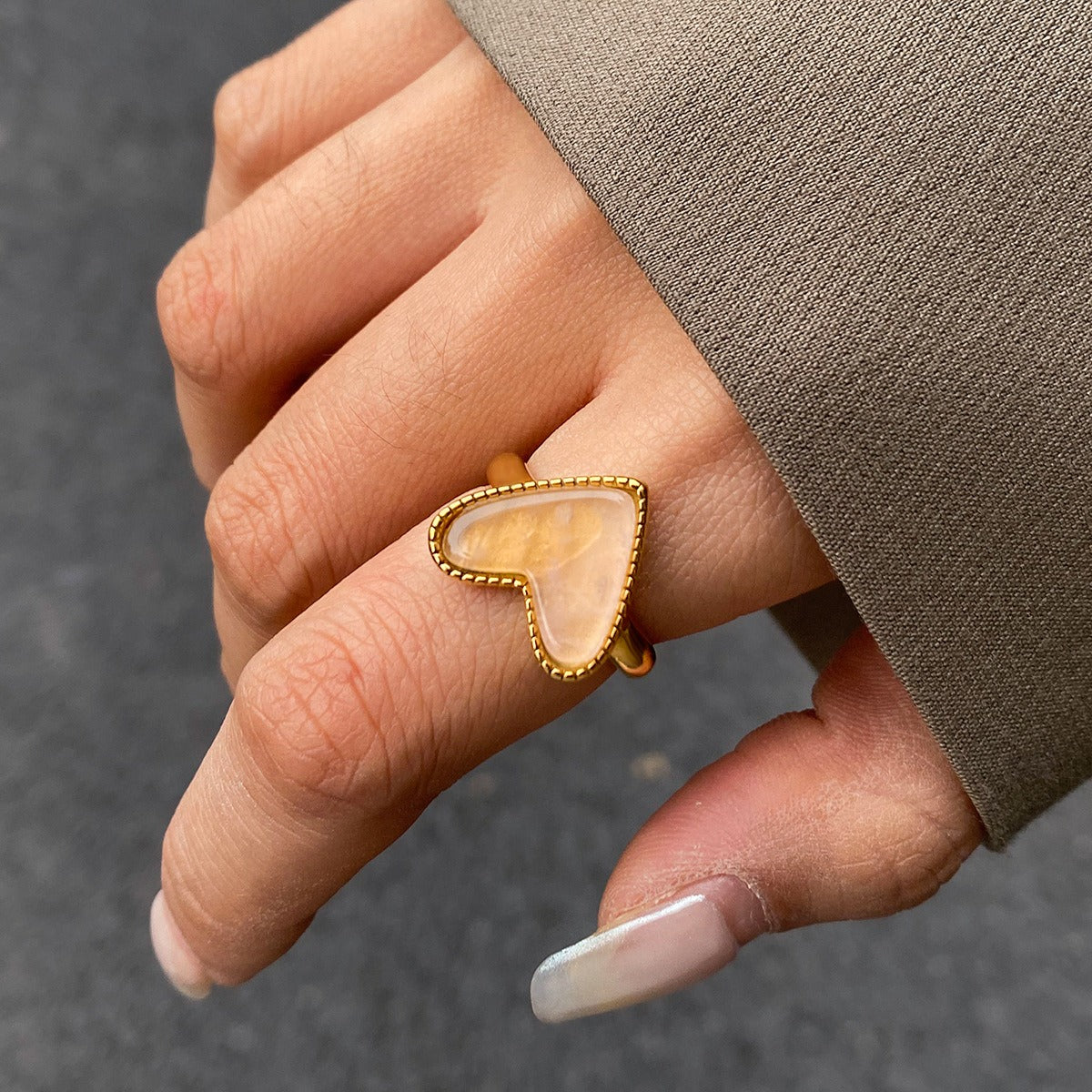 18K gold heart-shaped ring with textured design