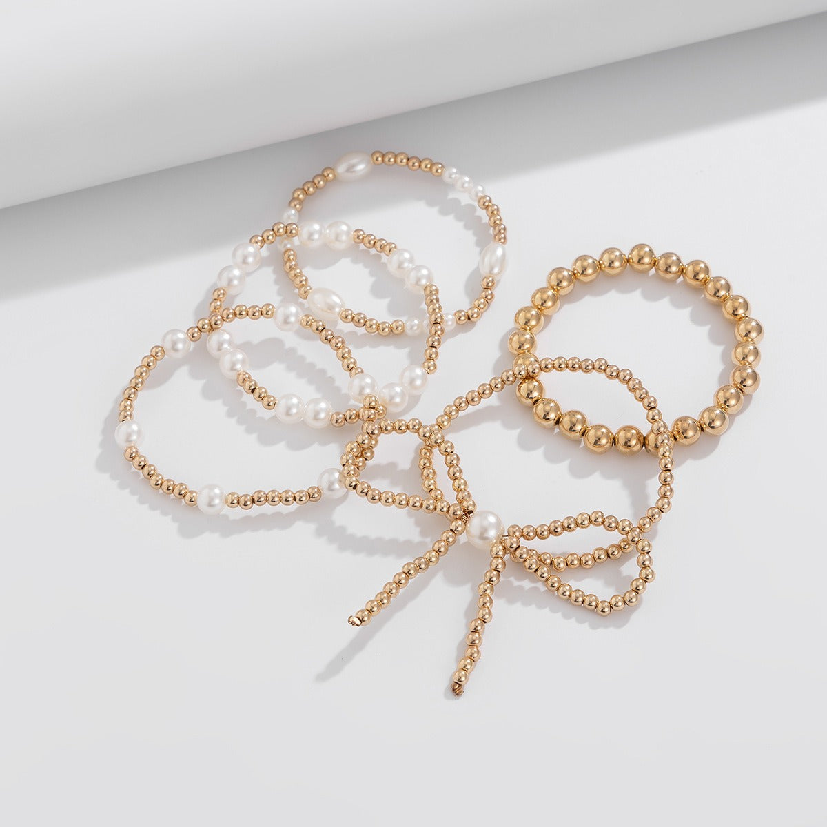 18k gold bow pearl beaded bracelet
